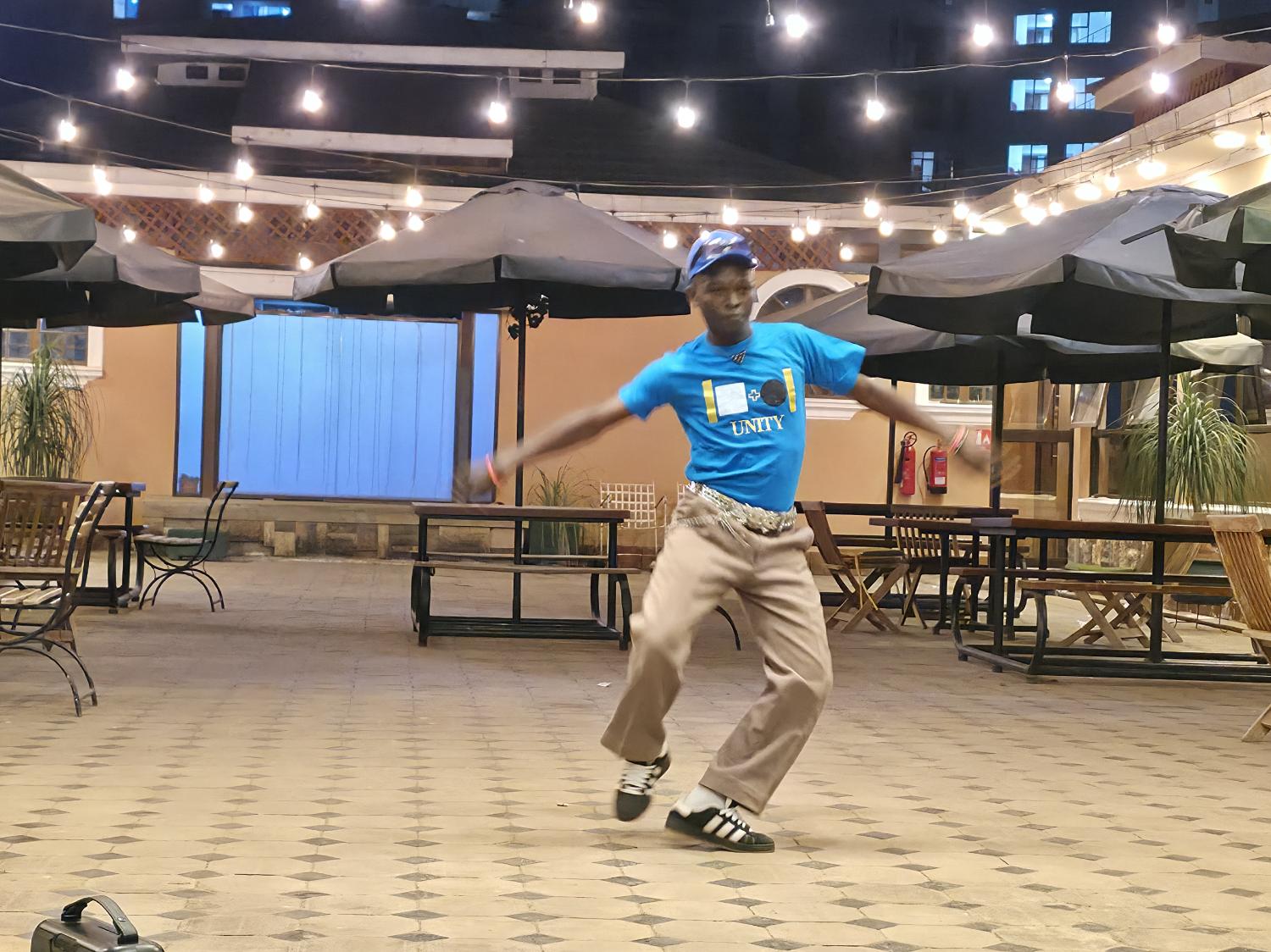 Unity dancer in a blue tee